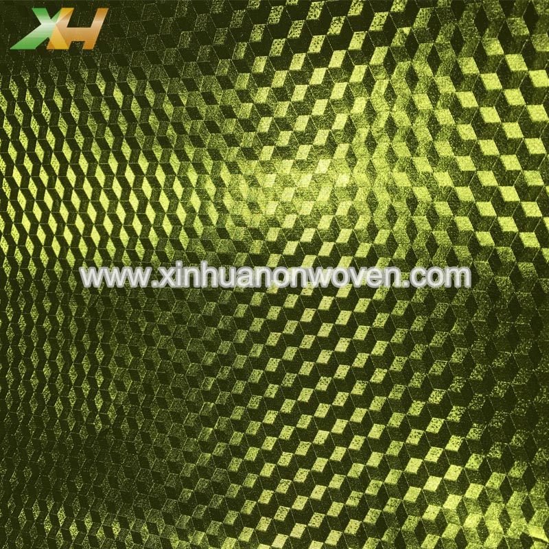 Metallic laminated non woven fabric